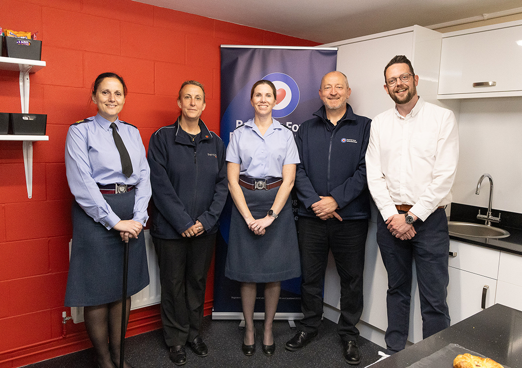 A group image in the kitchen consisting (left to right), The Station Warrant Officer, a Serco representative, our Station Commander, Andy Cairns RAFBF and Craig Hutton CDO.